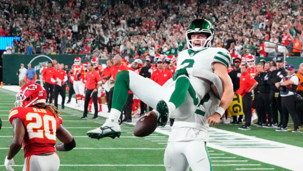 Jets' QB Zach Wilson celebrates a successful two-point conversion against the Chiefs